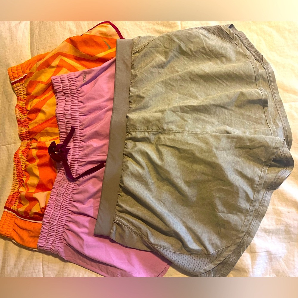 Lot of three athletic shorts. Size L and M